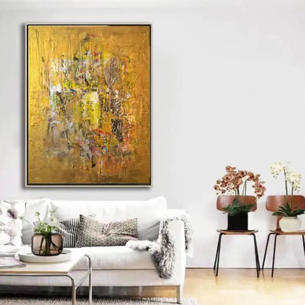 Room mockup. An ochre and yellow textured field with a dense central cluster of grey, cream, rust and dark scraped marks.