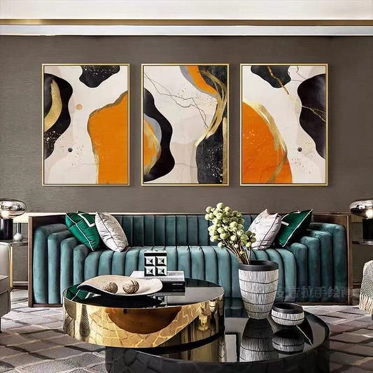 Room mockup. Three-panel abstract artwork with broad orange, black and cream curves and fine winding lines.