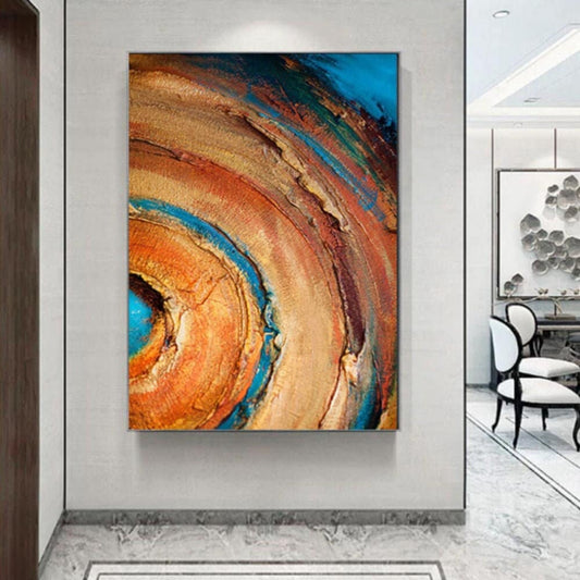 Room mockup. Broad concentric orange, ochre and rust arcs curve around a turquoise centre, with dark blue outer patches and rough texture.
