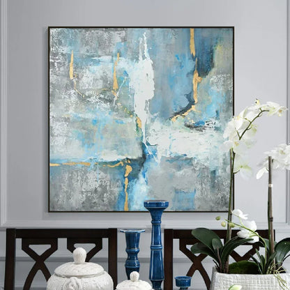 Room mockup showing pale blue, grey and white textured fields crossed by thin dark and gold-coloured irregular lines.