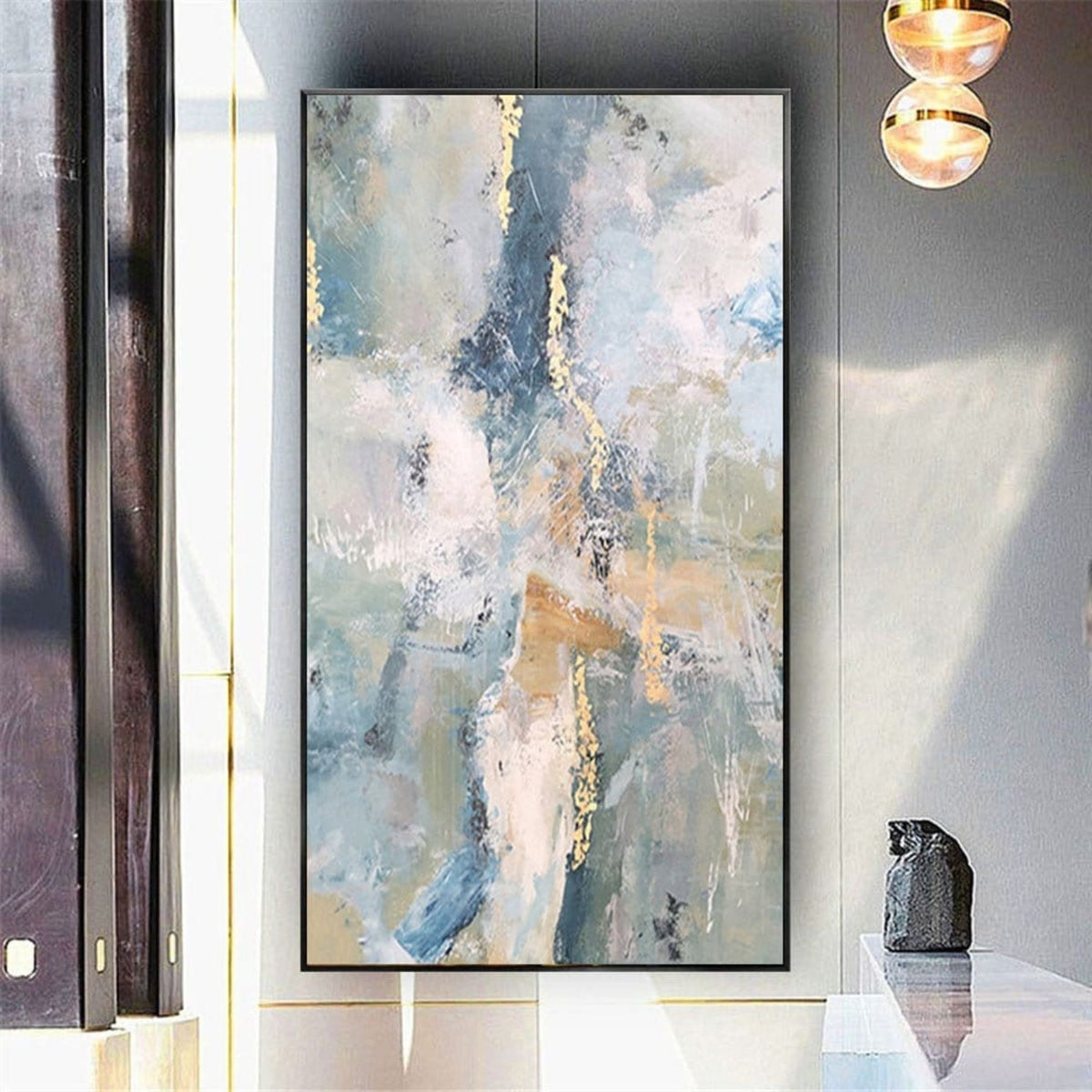 Room mockup. Pale blue, pink and grey scraped fields with thin gold-coloured marks and muted ochre horizontal strokes.