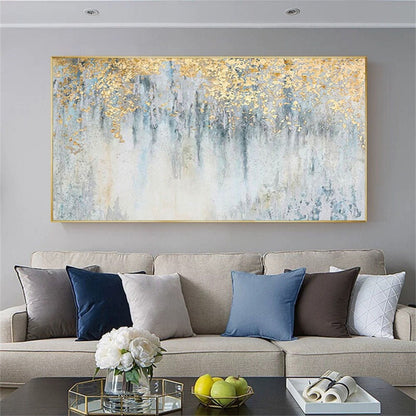 Room mockup. Gold-coloured textured foliage-like marks hang over fine dark vertical drips on a pale blue and white field.