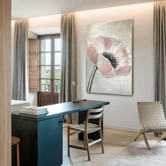 Room mockup. A large pale pink poppy with a textured black centre and two slender dark stems against soft grey-white.
