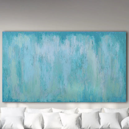 Room mockup showing pale turquoise and white abstract painting with soft washes and faint vertical streaks.