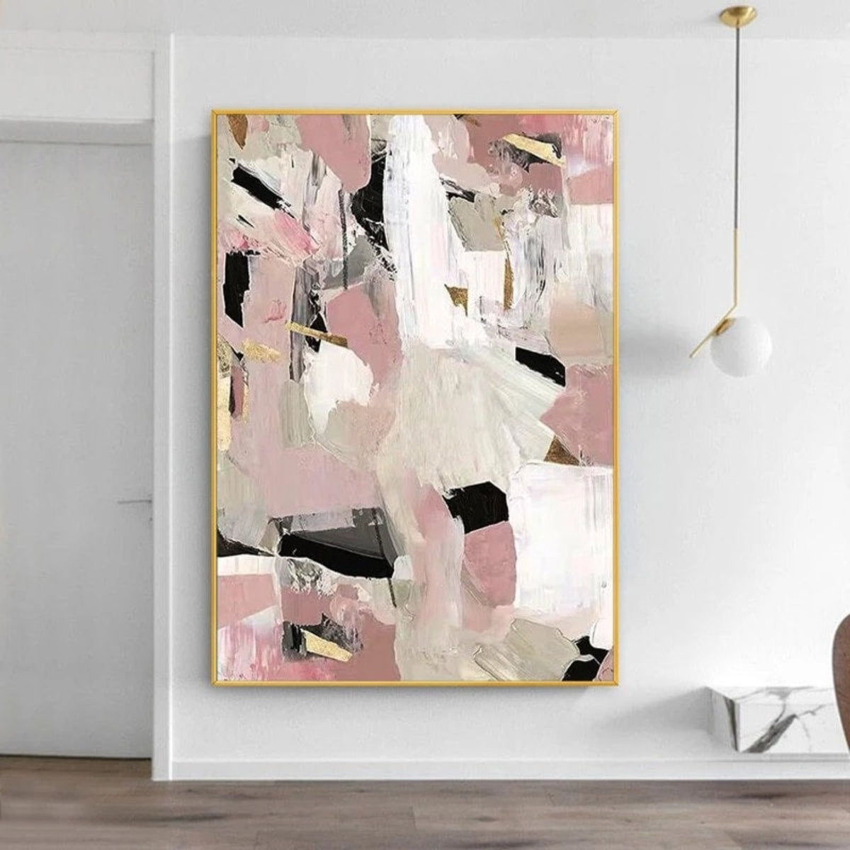 Room mockup. Dusty pink, beige and white angular patches overlap short black strokes and fine gold-coloured accents.