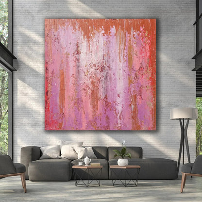 Room mockup showing pink and purple abstract painting with fine vertical drips, red accents and a narrow orange upper band.