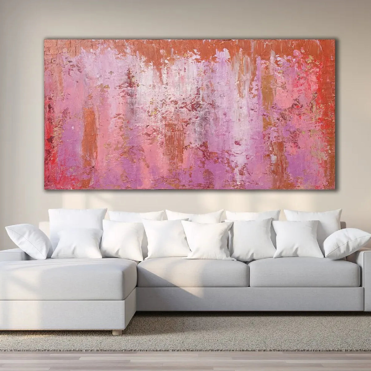 Room mockup showing pink and purple abstract painting with fine vertical drips, red accents and a narrow orange upper band.