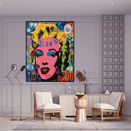 Room mockup. Marilyn Monroe portrait with a bright pink face, yellow hair and black outlines amid colourful graffiti lettering.