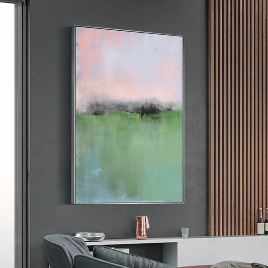 Room mockup showing soft green lower field beneath a pink and pale blue sky, separated by a blurred dark horizon.
