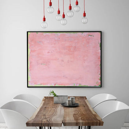 Room mockup showing soft pink abstract painting with a mottled surface and thin pale green edging.