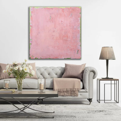 Room mockup showing soft pink abstract painting with a mottled surface and thin pale green edging.