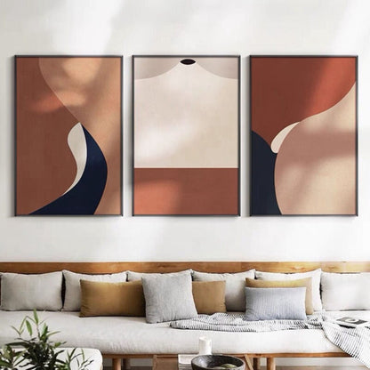 Room mockup. Three-panel abstract artwork with terracotta, cream and navy curved geometric shapes.