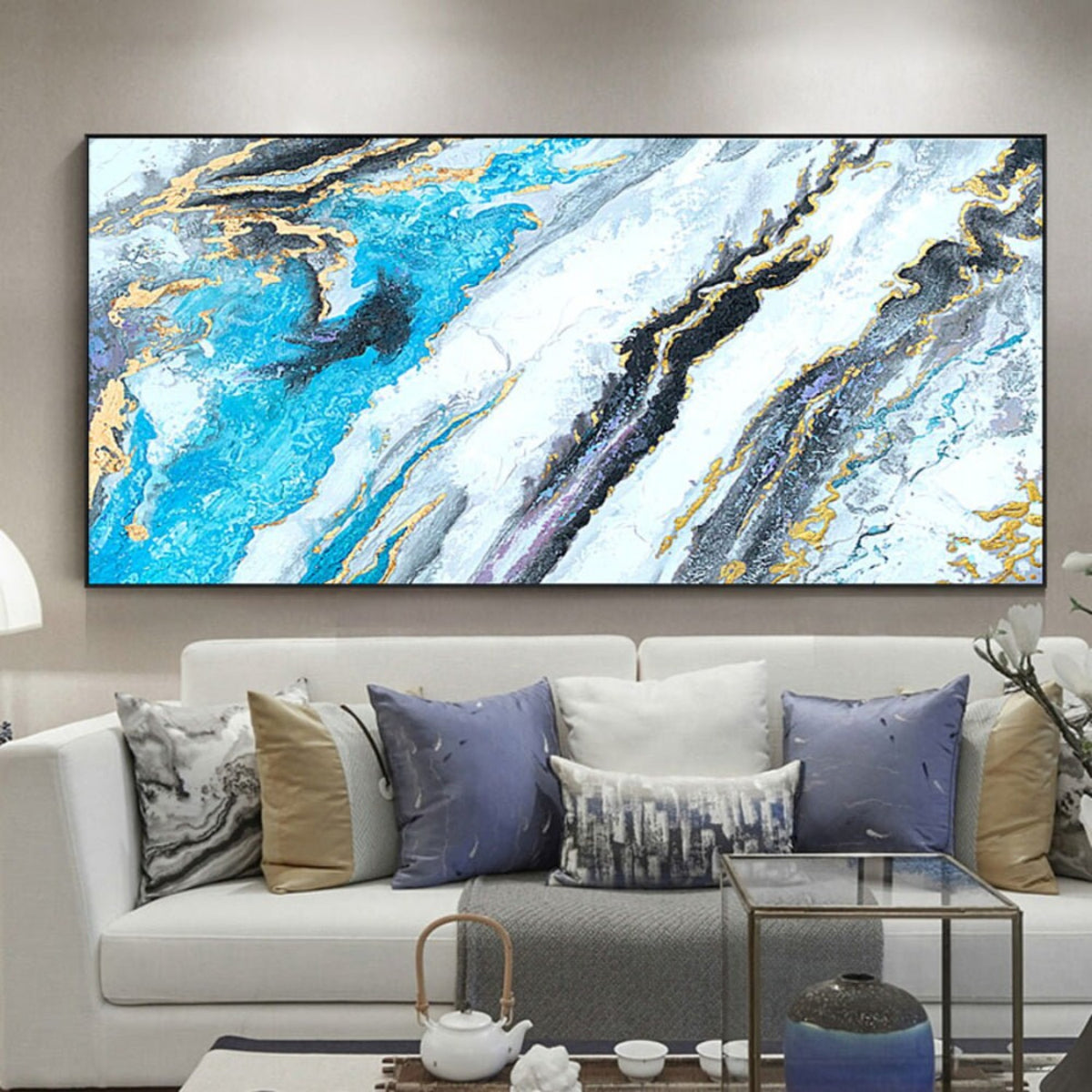 Room mockup. Broad diagonal turquoise, white and black flowing bands with fine gold-coloured edges and layered stone-like texture.