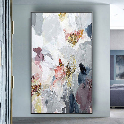 Room mockup. Large white textured flower-like forms overlap grey, muted pink and navy patches with small ochre centres.