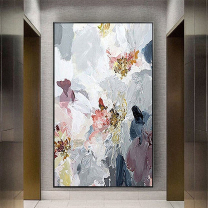 Room mockup. Large white textured flower-like forms overlap grey, muted pink and navy patches with small ochre centres.