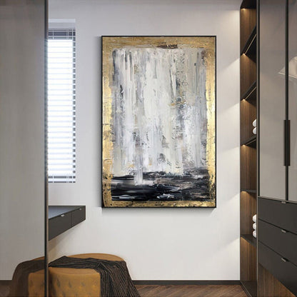Room mockup. Long white and grey vertical strokes fall toward a black lower band, bordered by rough gold-coloured texture.