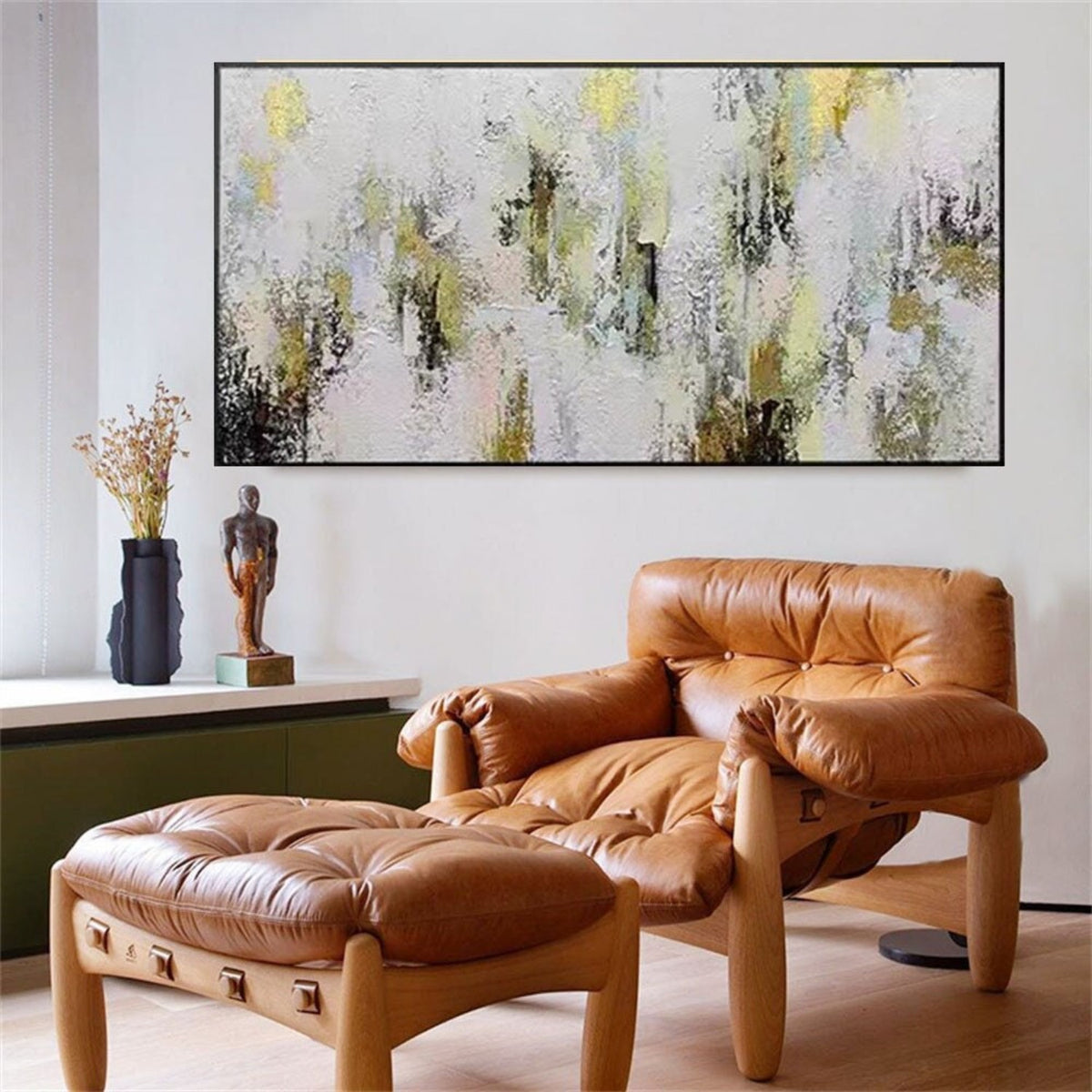 Room mockup. Dense white and pale grey textured dabs surround scattered black vertical marks and soft yellow patches.