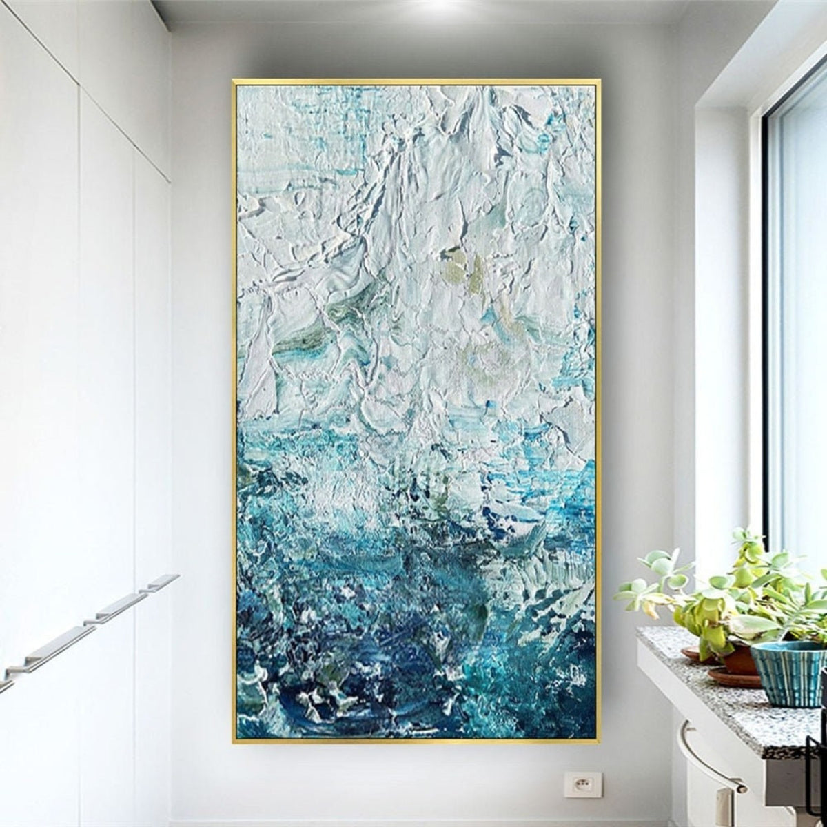 Room mockup. Thick white ridges and dabs fade through pale turquoise into a dense dark blue-green lower field.
