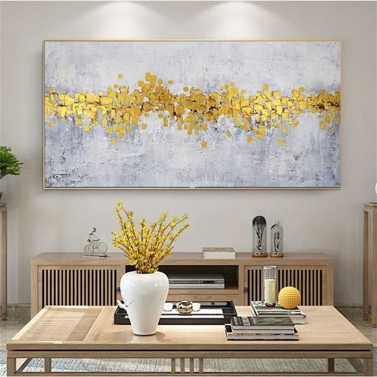 Room mockup. A dense irregular yellow and gold-coloured band crosses a pale grey textured background with fine drips below.